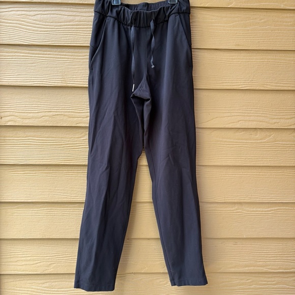 Lululemon On the Fly 7/8 pant in Black Size 2 - Picture 3 of 6